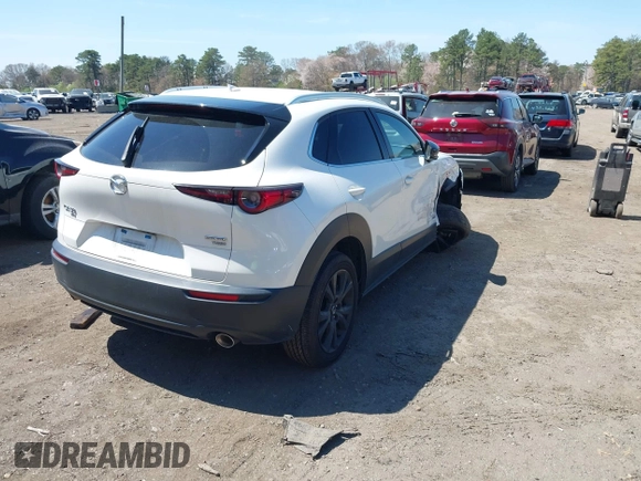 ✅ 2021 Mazda CX-30 Premium • VIN: 3MVDMBDY1MM306319 • Lot: 44919421. Wystawiony na IAAI z przebiegiem 21 747 mil. Bezpłatny archiwum sprzedaży aukcyjnych z USA i szczegółowy raport historii pojazdu na DreamBid. Zdjęcie 4.
