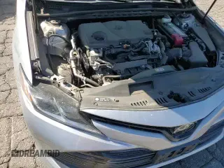 2019 Toyota Camry LE z VIN 4T1B11HKXKU821888, wystawiony jako Copart lot #86159375 z przebiegiem 64 469 mil mil oraz Szkoda całkowita • Salvage title. Historia ofert i sprzedaży dostępna na DreamBid. Obrazek 13.