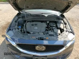 ✅ 2021 Mazda CX-5 Touring • VIN: JM3KFACM7M0113548 • Лот: 66671995. Опубликован ранее на Copart с пробегом 75 399 миль. Бесплатный доступ к архиву аукционных продаж из США и подробный отчёт об истории автомобиля на DreamBid. Изображение 15.