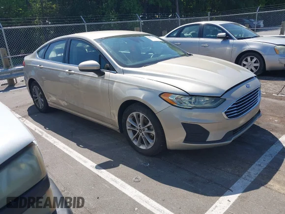 ✅ 2019 Ford Fusion SE • VIN: 3FA6P0HD9KR159668 • Lot: 45006308. Wystawiony na IAAI z przebiegiem 103 050 mil. Bezpłatny archiwum sprzedaży aukcyjnych z USA i szczegółowy raport historii pojazdu na DreamBid. Zdjęcie 1.