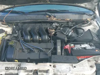 ✅ 2003 Ford Taurus SE • VIN: 1FAFP58SX3A245997 • Lot: 42520332. Listed on IAAI with 140,937 mi. Free auction sales archive from the USA and detailed vehicle history report at DreamBid. Image 12.