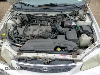 ✅ 2000 Mazda Protege ES • VIN: JM1BJ2234Y0267579 • Lot: 84492724. Wystawiony na Copart z przebiegiem 84 807 mil. Bezpłatny archiwum sprzedaży aukcyjnych z USA i szczegółowy raport historii pojazdu na DreamBid. Zdjęcie 13.