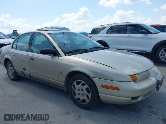 ✅ 2002 Saturn SL • VIN: 1G8ZK54732Z132538 • Лот: 42560758. Опубліковано раніше на IAAI з пробігом 240 734 миль. Безкоштовний доступ до архіву аукціонних продажів зі США та докладний звіт про історію автомобіля на DreamBid. Зображення 1.