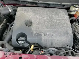 ✅ 2019 Chevrolet Traverse Premier • VIN: 1GNEVKKW3KJ309812 • Lot: 57428595. Wystawiony na Copart z przebiegiem 97 056 mil. Bezpłatny archiwum sprzedaży aukcyjnych z USA i szczegółowy raport historii pojazdu na DreamBid. Zdjęcie 14.