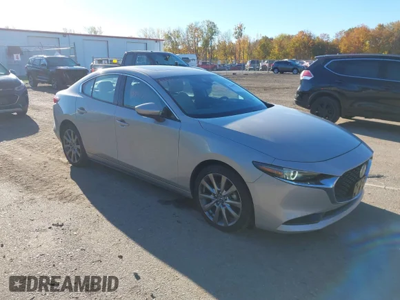 ✅ 2022 Mazda 3 Premium • VIN: 3MZBPADL6NM308807 • Лот: 43395777. Опубликован ранее на IAAI с пробегом 24 455 миль. Бесплатный доступ к архиву аукционных продаж из США и подробный отчёт об истории автомобиля на DreamBid. Изображение 1.