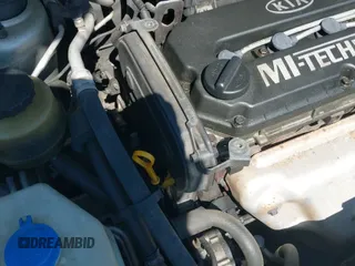 ✅ 2001 Kia Rio • VIN: KNADC123616516431 • Lot: 42797344. Listed on IAAI with 128,355 mi. Free auction sales archive from the USA and detailed vehicle history report at DreamBid. Image 12.