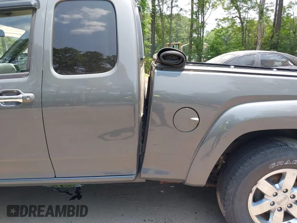 ✅ 2012 GMC Canyon SLE2 • VIN: 1GTJ6PFE2C8128602 • Лот: 42421110. Опубліковано раніше на IAAI з пробігом 79 273 миль. Безкоштовний доступ до архіву аукціонних продажів зі США та докладний звіт про історію автомобіля на DreamBid. Зображення 6.
