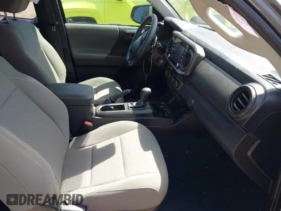 ✅ 2021 Toyota Tacoma SR • VIN: 3TYSZ5AN4MT009992 • Lot: 44809233. Wystawiony na IAAI z przebiegiem 66 335 mil. Bezpłatny archiwum sprzedaży aukcyjnych z USA i szczegółowy raport historii pojazdu na DreamBid. Zdjęcie 5.