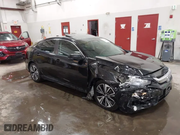 ✅ 2017 Honda Civic EX-T • VIN: 2HGFC1E33HH643770 • Lot: 43110384. Listed on IAAI with 66,337 mi. Free auction sales archive from the USA and detailed vehicle history report at DreamBid. Image 1.