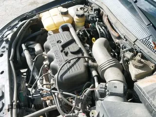 ✅ 2003 Ford Focus LX • VIN: 1FAFP33P53W180521 • Lot: 43639979. Wystawiony na IAAI z przebiegiem 102 163 mil. Bezpłatny archiwum sprzedaży aukcyjnych z USA i szczegółowy raport historii pojazdu na DreamBid. Zdjęcie 16.