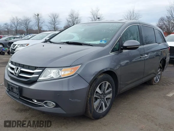 ✅ 2015 Honda Odyssey Touring Elite • VIN: 5FNRL5H93FB001541 • Lot: 44156031. Listed on IAAI with 149,828 mi. Free auction sales archive from the USA and detailed vehicle history report at DreamBid. Image 2.