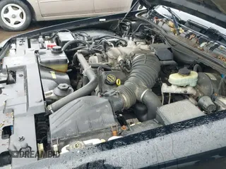 ✅ 2003 Mercury Marauder • VIN: 2MEHM75V43X630841 • Лот: 42318085. Опубликован ранее на IAAI с пробегом 114 683 миль. Бесплатный доступ к архиву аукционных продаж из США и подробный отчёт об истории автомобиля на DreamBid. Изображение 13.