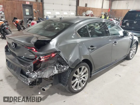 ✅ 2021 Mazda 3 • VIN: JM1BPBDL7M1334689 • Lot: 43497911. Listed on IAAI with 38,351 mi. Free auction sales archive from the USA and detailed vehicle history report at DreamBid. Image 6.