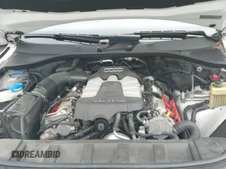 ✅ 2014 Audi Q7 S line Prestige • VIN: WA1DGAFE5ED013911 • Лот: 42695765. Опубликован ранее на IAAI с пробегом 128 248 миль. Бесплатный доступ к архиву аукционных продаж из США и подробный отчёт об истории автомобиля на DreamBid. Изображение 19.