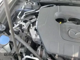 ✅ 2023 Mazda CX-30 S Select • VIN: 3MVDMBBM4PM545996 • Лот: 91359305. Опубликован ранее на Copart с пробегом 24 637 миль. Бесплатный доступ к архиву аукционных продаж из США и подробный отчёт об истории автомобиля на DreamBid. Изображение 16.