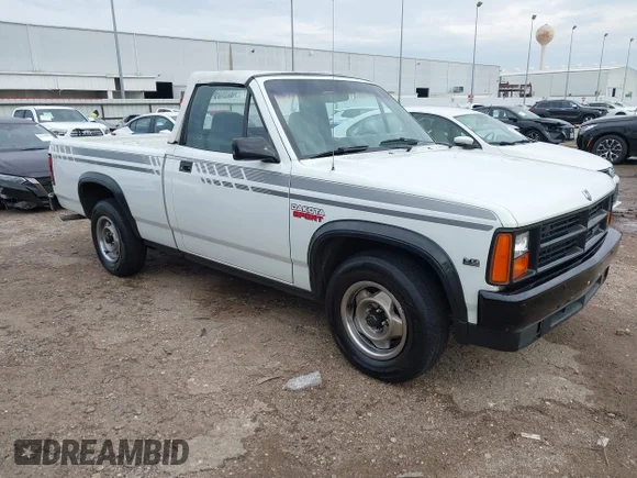 ✅ 1990 Dodge Dakota • VIN: 1B7FL69X3LS606132 • Lot: 43851273. Wystawiony na IAAI z przebiegiem 197 146 mil. Bezpłatny archiwum sprzedaży aukcyjnych z USA i szczegółowy raport historii pojazdu na DreamBid. Zdjęcie 1.