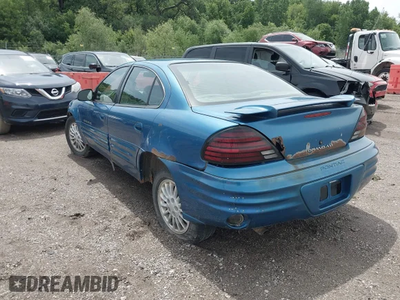 ✅ 1999 Pontiac Grand Am SE1 • VIN: 1G2NE52T5XM916224 • Lot: 45342590. Wystawiony na IAAI z przebiegiem 303 972 mil. Bezpłatny archiwum sprzedaży aukcyjnych z USA i szczegółowy raport historii pojazdu na DreamBid. Zdjęcie 3.