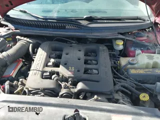 ✅ 1999 Chrysler 300M M • VIN: 2C3HE66G9XH599812 • Lot: 42117854. Wystawiony na IAAI z przebiegiem 192 443 mil. Bezpłatny archiwum sprzedaży aukcyjnych z USA i szczegółowy raport historii pojazdu na DreamBid. Zdjęcie 18.