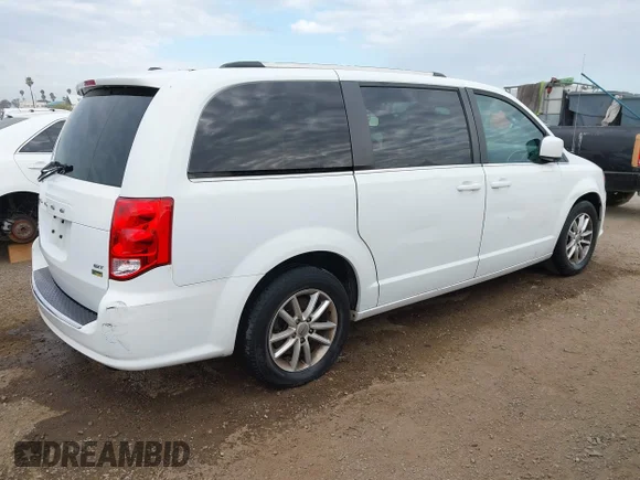 ✅ 2018 Dodge Grand Caravan SXT • VIN: 2C4RDGCG1JR241280 • Lot: 45007456. Listed on IAAI with 148,009 mi. Free auction sales archive from the USA and detailed vehicle history report at DreamBid. Image 4.