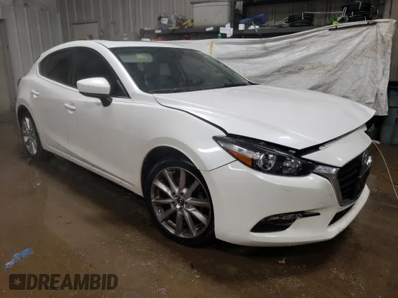 ✅ 2017 Mazda 3 Touring • VIN: JM1BN1L30H1139914 • Лот: 37617883. Опубликован ранее на Copart с пробегом 86 826 миль. Бесплатный доступ к архиву аукционных продаж из США и подробный отчёт об истории автомобиля на DreamBid. Изображение 4.