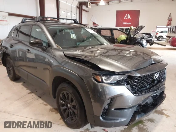 ✅ 2025 Mazda CX-50 Hybrid Premium Package • VIN: 7MMVAADW0SN111838 • Lot: 44595622. Listed on IAAI with 18,602 mi. Free auction sales archive from the USA and detailed vehicle history report at DreamBid. Image 1.