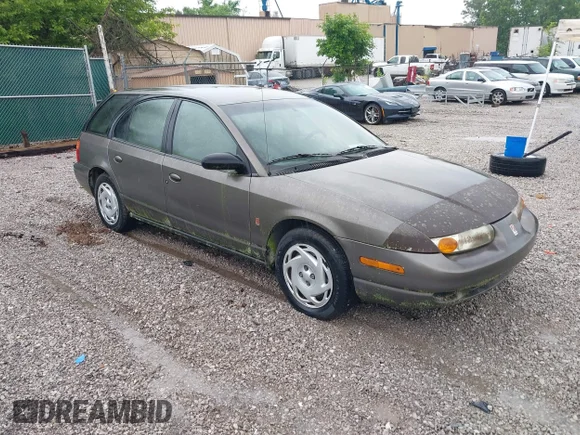 ✅ 2000 Saturn SW • VIN: 1G8ZJ8274YZ132063 • Lot: 42453187. Listed on IAAI with 140,166 mi. Free auction sales archive from the USA and detailed vehicle history report at DreamBid. Image 1.