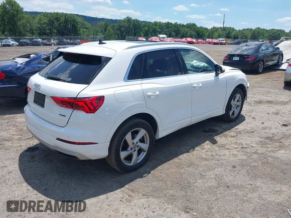 ✅ 2020 Audi Q3 Premium • VIN: WA1AECF39L1010852 • Lot: 39768583. Wystawiony na IAAI z przebiegiem 100 414 mil. Bezpłatny archiwum sprzedaży aukcyjnych z USA i szczegółowy raport historii pojazdu na DreamBid. Zdjęcie 4.