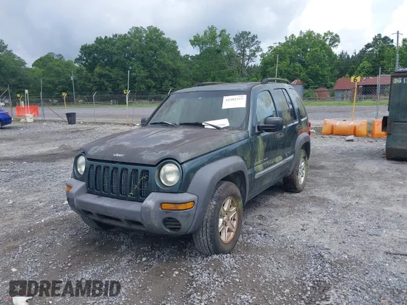 ✅ 2002 Jeep Liberty Sport • VIN: 1J4GK48K82W351318 • Lot: 42482313. Listed on IAAI with 219,995 mi. Free auction sales archive from the USA and detailed vehicle history report at DreamBid. Image 2.