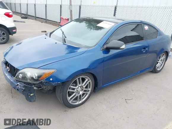 ✅ 2009 Scion tC • VIN: JTKDE167090298598 • Lot: 42357448. Wystawiony na IAAI z przebiegiem 143 301 mil. Bezpłatny archiwum sprzedaży aukcyjnych z USA i szczegółowy raport historii pojazdu na DreamBid. Zdjęcie 2.