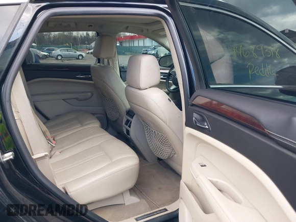 ✅ 2010 Cadillac SRX Premium Collection • VIN: 3GYFNCEY9AS574905 • Lot: 44689318. Wystawiony na IAAI z przebiegiem 168 626 mil. Bezpłatny archiwum sprzedaży aukcyjnych z USA i szczegółowy raport historii pojazdu na DreamBid. Zdjęcie 8.