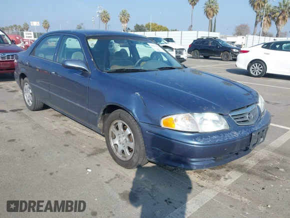 ✅ 2002 Mazda 626 LX • VIN: 1YVGF22C125278180 • Лот: 44311378. Опубликован ранее на IAAI с пробегом 149 074 миль. Бесплатный доступ к архиву аукционных продаж из США и подробный отчёт об истории автомобиля на DreamBid. Изображение 1.