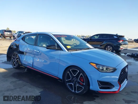 ✅ 2022 Hyundai Veloster • VIN: KMHT36AH9NU011425 • Lot: 43746942. Listed on IAAI with 24,285 mi. Free auction sales archive from the USA and detailed vehicle history report at DreamBid. Image 1.