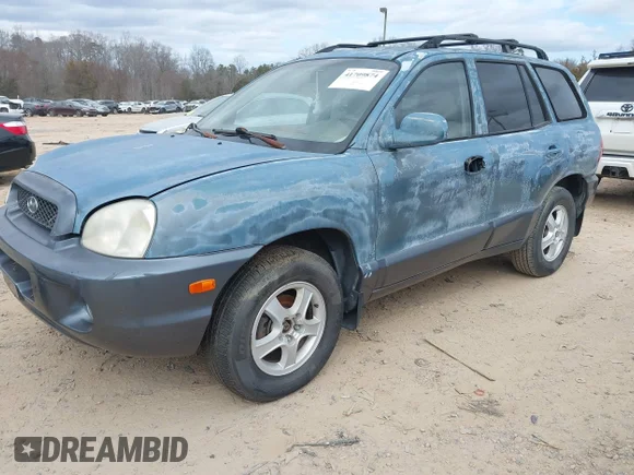 ✅ 2002 Hyundai Santa Fe GLS • VIN: KM8SC13D82U241929 • Lot: 41709874. Listed on IAAI with 153,791 mi. Free auction sales archive from the USA and detailed vehicle history report at DreamBid. Image 2.