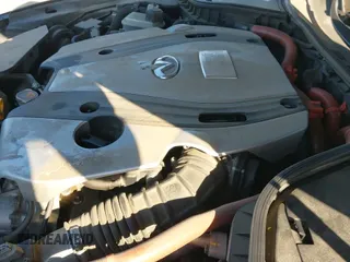 ✅ 2014 Infiniti Q50 Hybrid Premium • VIN: JN1AV7AP1EM690435 • Lot: 43642478. Wystawiony na IAAI z przebiegiem 220 939 mil. Bezpłatny archiwum sprzedaży aukcyjnych z USA i szczegółowy raport historii pojazdu na DreamBid. Zdjęcie 19.