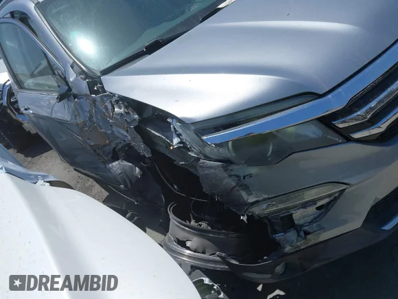 ✅ 2016 Honda Pilot Elite • VIN: 5FNYF6H03GB059824 • Lot: 44953441. Listed on IAAI with 117,499 mi. Free auction sales archive from the USA and detailed vehicle history report at DreamBid. Image 1.