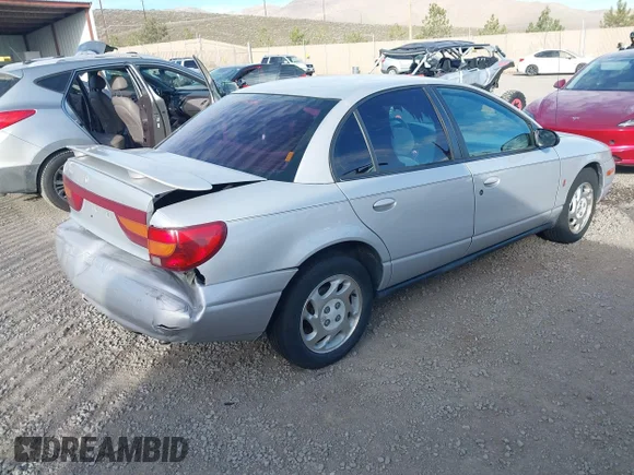 ✅ 2001 Saturn SL • VIN: 1G8ZJ52761Z240592 • Лот: 44781032. Опубліковано раніше на IAAI з пробігом 295 934 миль. Безкоштовний доступ до архіву аукціонних продажів зі США та докладний звіт про історію автомобіля на DreamBid. Зображення 4.