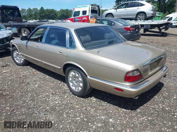 ✅ 2000 Jaguar XJ • VIN: SAJDA14C2YLF10079 • Лот: 43016590. Опубліковано раніше на IAAI з пробігом 72 810 миль. Безкоштовний доступ до архіву аукціонних продажів зі США та докладний звіт про історію автомобіля на DreamBid. Зображення 3.