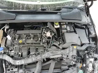 ✅ 2017 Ford Focus Titanium • VIN: 1FADP3J21HL207060 • Lot: 69495275. Wystawiony na Copart z przebiegiem 100 856 mil. Bezpłatny archiwum sprzedaży aukcyjnych z USA i szczegółowy raport historii pojazdu na DreamBid. Zdjęcie 15.