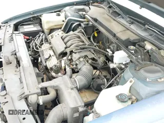 ✅ 1994 Pontiac Bonneville SE • VIN: 1G2HX52LXR4221652 • Lot: 41936553. Listed on IAAI with 98,928 mi. Free auction sales archive from the USA and detailed vehicle history report at DreamBid. Image 12.