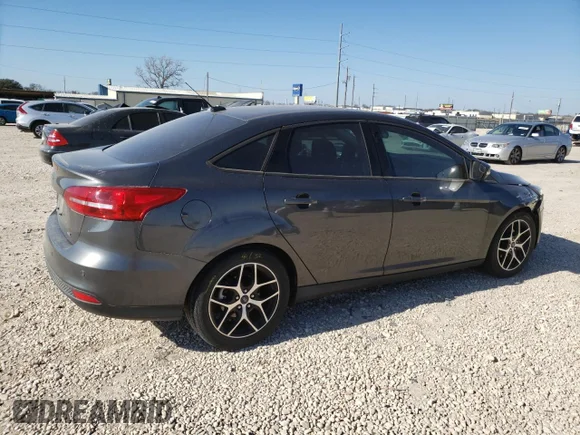 ✅ 2018 Ford Focus SEL • VIN: 1FADP3H2XJL216626 • Лот: 36471223. Опубліковано раніше на Copart з пробігом 26 297 миль. Безкоштовний доступ до архіву аукціонних продажів зі США та докладний звіт про історію автомобіля на DreamBid. Зображення 3.