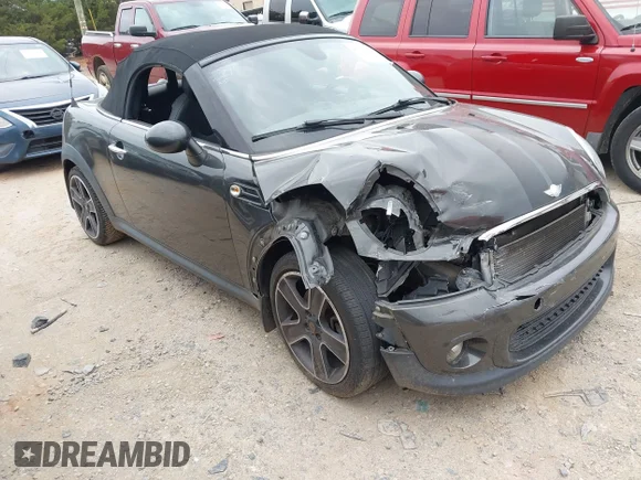 ✅ 2014 MINI Roadster • VIN: WMWSY1C50ET719539 • Lot: 45085875. Listed on IAAI with 145,762 mi. Free auction sales archive from the USA and detailed vehicle history report at DreamBid. Image 1.