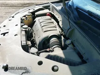 2015 Chevrolet Traverse LT z VIN 1GNKRHKD8FJ124105, wystawiony jako IAAI lot #43425664 z przebiegiem 146 846 mil mil oraz . Historia ofert i sprzedaży dostępna na DreamBid. Obrazek 23.