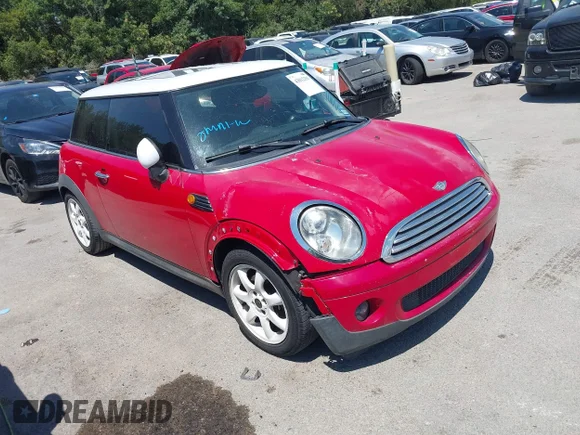 ✅ 2009 MINI Hardtop • VIN: WMWMF33529TU75568 • Lot: 43012391. Listed on IAAI with 218,591 mi. Free auction sales archive from the USA and detailed vehicle history report at DreamBid. Image 1.