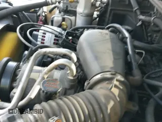 2003 Chevrolet Blazer LS z VIN 1GNCT18X83K145413, wystawiony jako IAAI lot #42239223 z przebiegiem 161 632 mil mil oraz . Historia ofert i sprzedaży dostępna na DreamBid. Obrazek 13.