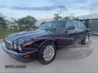 ✅ 2000 Jaguar XJ • VIN: SAJDA23C9YLF18784 • Лот: 91946295. Опубликован ранее на Copart с пробегом 81 605 миль. Бесплатный доступ к архиву аукционных продаж из США и подробный отчёт об истории автомобиля на DreamBid. Изображение 12.