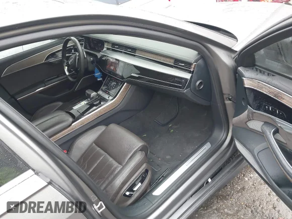 ✅ 2019 Audi A8 • VIN: WAU8DAF86KN001702 • Лот: 44014464. Опубліковано раніше на IAAI з пробігом 58 201 миль. Безкоштовний доступ до архіву аукціонних продажів зі США та докладний звіт про історію автомобіля на DreamBid. Зображення 5.