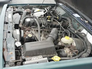 ✅ 1999 Jeep Cherokee Sport • VIN: 1J4FF68S8XL597869 • Lot: 43737456. Wystawiony na IAAI z przebiegiem 178 584 mil. Bezpłatny archiwum sprzedaży aukcyjnych z USA i szczegółowy raport historii pojazdu na DreamBid. Zdjęcie 12.