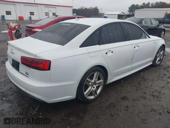 ✅ 2016 Audi A6 Prestige • VIN: WAUHGAFCXGN018280 • Лот: 41539242. Опубліковано раніше на IAAI з пробігом 114 343 миль. Безкоштовний доступ до архіву аукціонних продажів зі США та докладний звіт про історію автомобіля на DreamBid. Зображення 4.