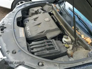 ✅ 2015 Cadillac SRX • VIN: 3GYFNAE39FS573334 • Lot: 42716820. Listed on IAAI with 98,446 mi. Free auction sales archive from the USA and detailed vehicle history report at DreamBid. Image 19.