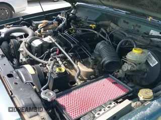 ✅ 1999 Jeep Cherokee Sport • VIN: 1J4FT68S1XL667138 • Lot: 42651020. Listed on IAAI with 200,324 mi. Free auction sales archive from the USA and detailed vehicle history report at DreamBid. Image 12.